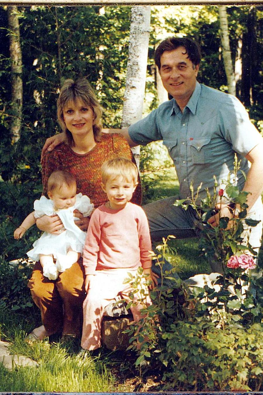 Robert Logan and Carol Bull with young Rob and baby Laura among the birches