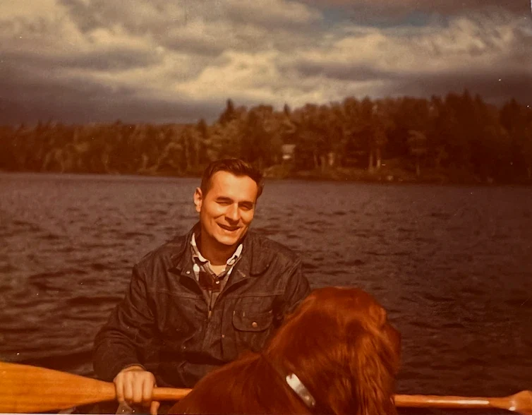 Robert Logan Bull (1931–2008) — the second generation — on Santa Claus Lake with his dog Red: the same day as Fred’s photo, the same canoe.